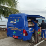 Dinas Perpusip Sulbar Laksanakan Layanan Perpustakaan Keliling di Area Pantai Wisata Pelabuhan Feri Simboro